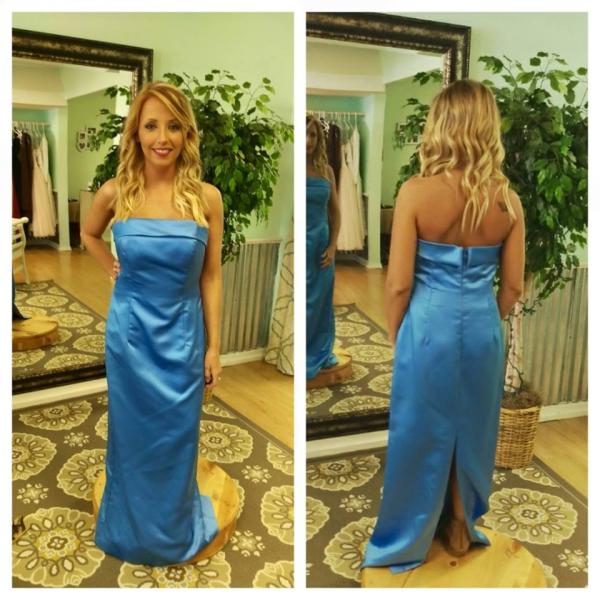 A beautiful strapless, blue bridesmaid dress.