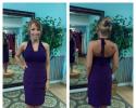 A stunning halter style bridesmaid dress featured in a gorgeous purple.