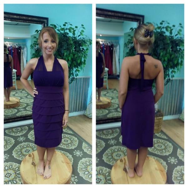 A stunning halter style bridesmaid dress featured in a gorgeous purple.