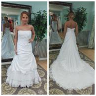Wedding gown with layered lace skirt
