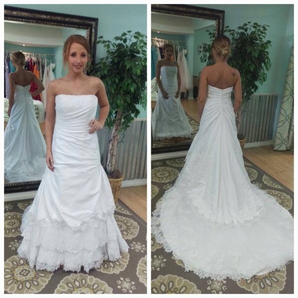 Wedding gown with layered lace skirt