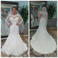 Lace wedding gown with long lace sleeves