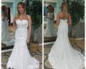 Lace wedding gown with beaded belt