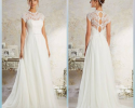 Wedding gown with capped sleeves and open lace back
