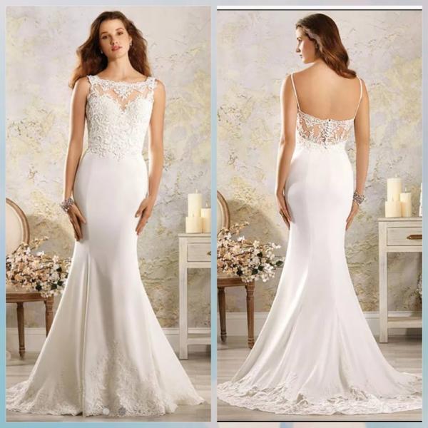 Fitted wedding gown with lace top and train