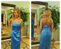 A beautiful strapless, blue bridesmaid dress.