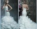 Fitted wedding gown with full layered skirt