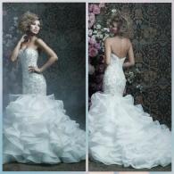 Fitted wedding gown with full layered skirt