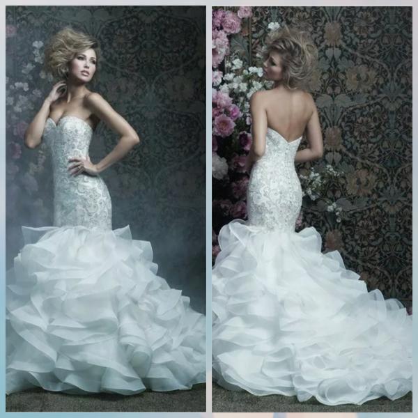 Fitted wedding gown with full layered skirt