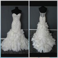Strapless wedding gown with ruffled skirt