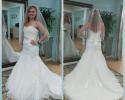 Lace wedding gown with beaded belt and train