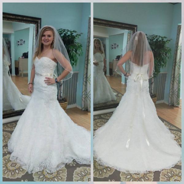 Lace wedding gown with beaded belt and train