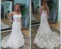 Lace wedding gown with pink belt
