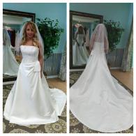 Wedding gown with full skirt and train