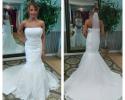 Strapless lace wedding gown with train