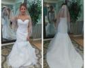 Wedding gown with sweetheart neckline and train