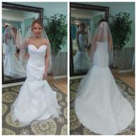 Wedding gown with sweetheart neckline and train